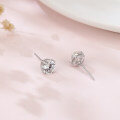 wholesale 925 Sterling Silver Elegant Sparkling Moissanite Stud Earrings In Plated with White Gold On Blush Pink Backdrop-0-1