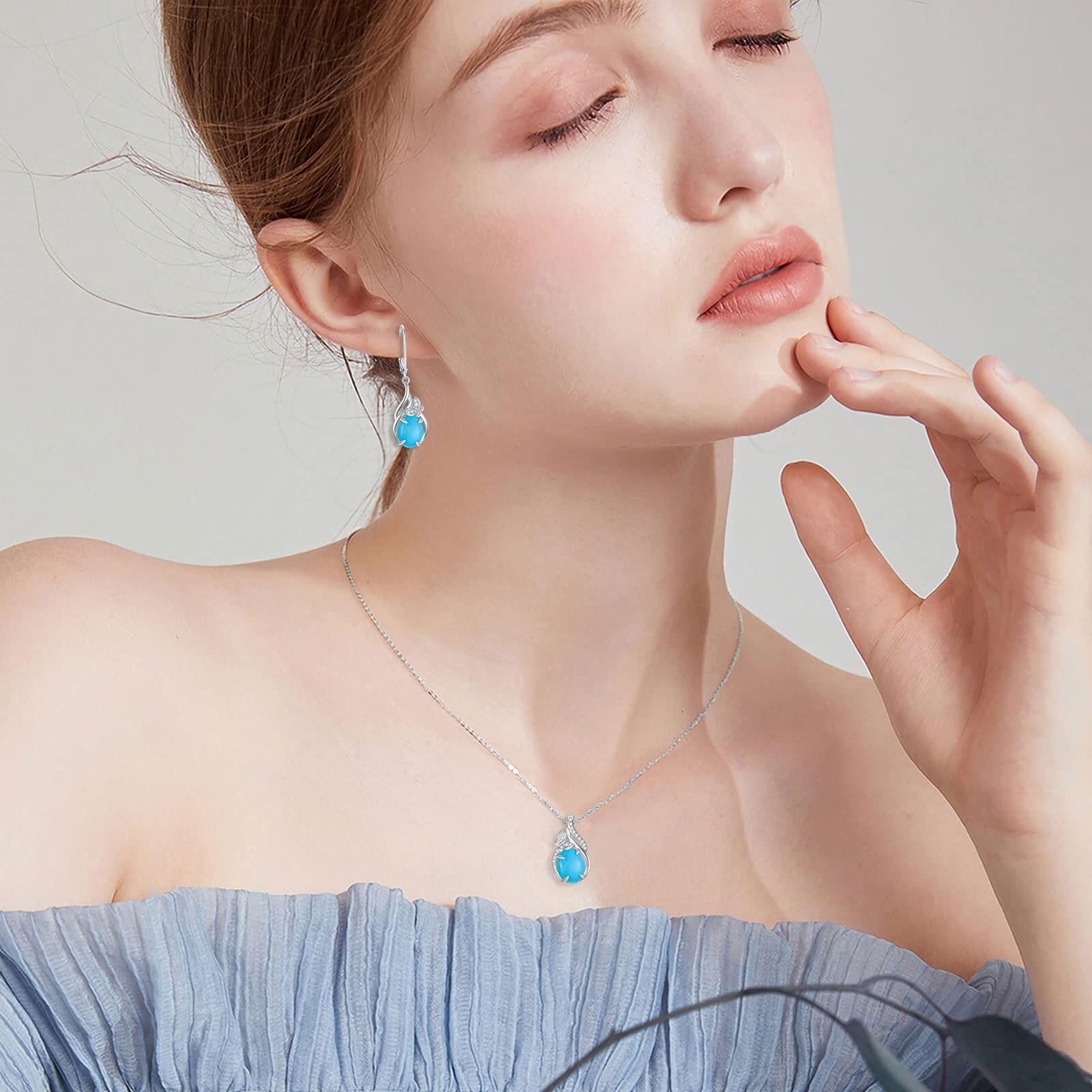 Sterling Silver Oval Cut Natural 7 * 9mm Blue Turquoise Dangle Earrings with Butterfly - Rhodium Plated-0-2